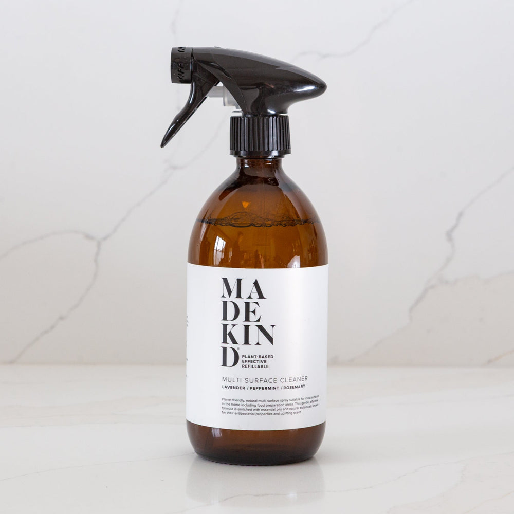 Photo of MadeKind Multi Surface Cleaner in amber glass bottle