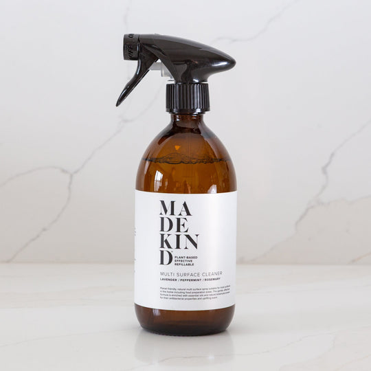 Photo of MadeKind Multi Surface Cleaner in amber glass bottle