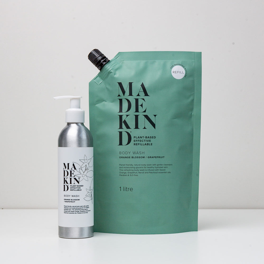 Photo of MadeKind body wash 1 Litre refill with an empty bottle