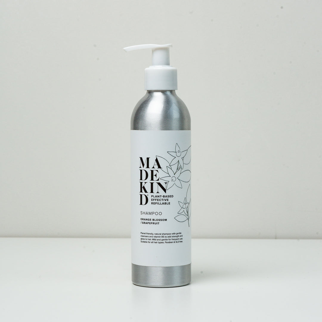 Photo of MadeKind's natural shampoo in an aluminium bottle