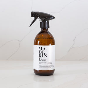 Photo of MadeKind Multi Surface Cleaner in amber glass bottle