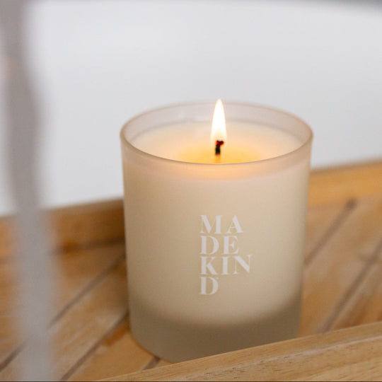 Photo of MadeKind Lit Candle on wooden tray