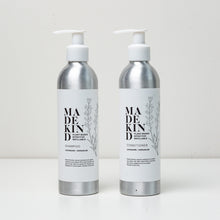 Load image into Gallery viewer, Photo of Madekind shampoo and conditioner in aluminium bottles 

