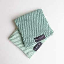 Load image into Gallery viewer, Photo of a set of 2 organic cotton knitted dishcloths by madeKind
