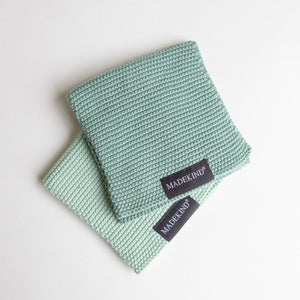 Photo of a set of 2 organic cotton knitted dishcloths by madeKind
