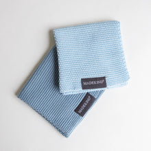 Load image into Gallery viewer, photo of MadeKind set of 2 knitted dish cloths in blue
