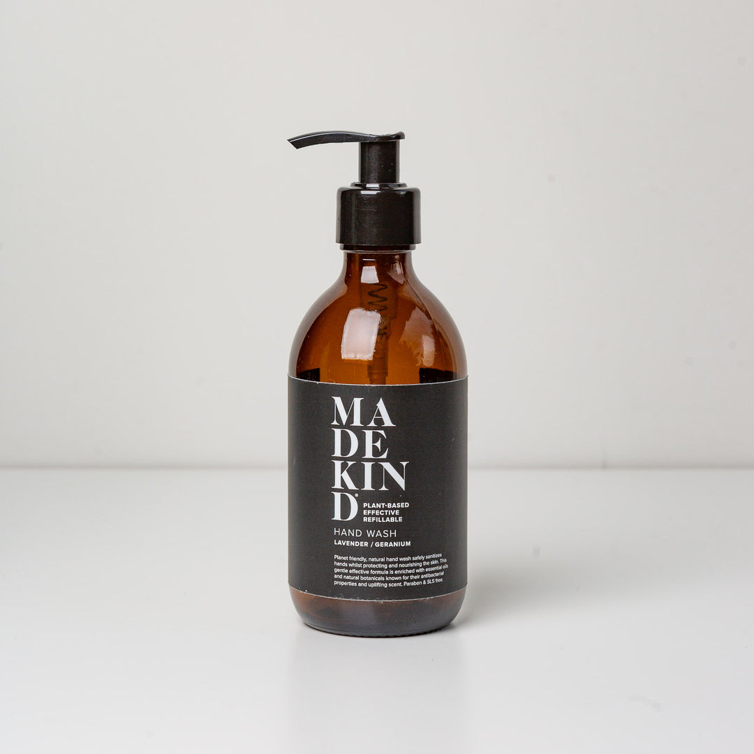 Photo of empty 300ml amber glass bottle with pump for lavender and geranium hand wash or hand lotion