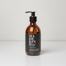 Load image into Gallery viewer, Photo of empty 300ml amber glass bottle with pump for lavender and geranium hand wash or hand lotion
