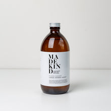 Load image into Gallery viewer, Photo of MadeKind natural floor cleaner in 500ml amber glass bottle
