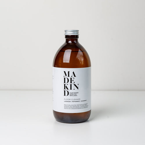 Photo of MadeKind natural floor cleaner in 500ml amber glass bottle