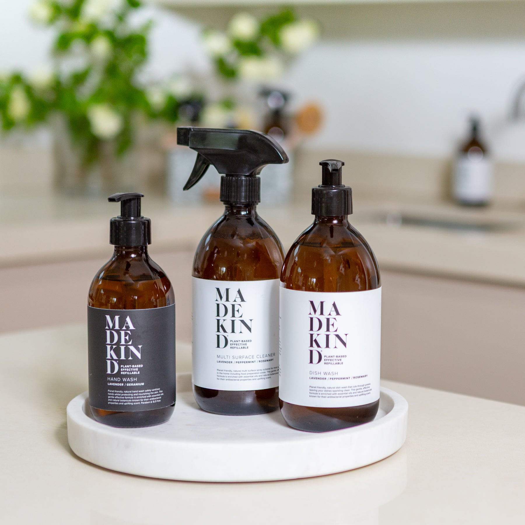 Photo of MadeKind Best Sellers; Multi Surface Cleaner, Dish Wash and hand wash in a kitchen on a round tray