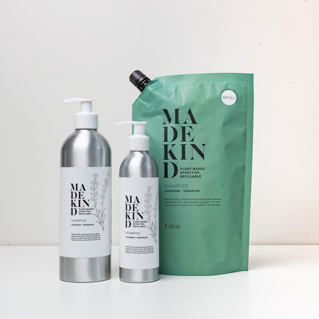 Photo of MadeKind Natural Shampoo in a 250ml aluminium bottle, 500ml aluminium bottle and 1 litre refill
