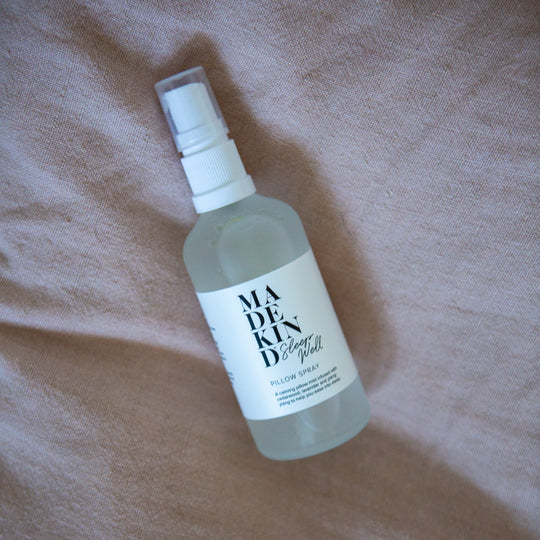 Photo of MadeKind Pillow Spray on pink bedlinen