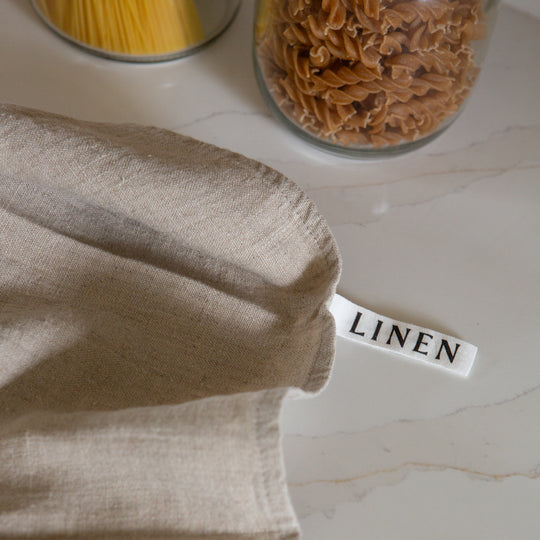 Photo of a kitchen with a woven linen tea towel