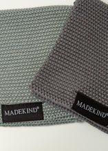 Load image into Gallery viewer, Photo of two grey madekind organic cotton  dishcloths 
