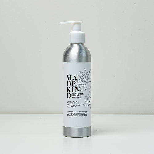 Photo of MadeKind's natural shampoo in an aluminium bottle
