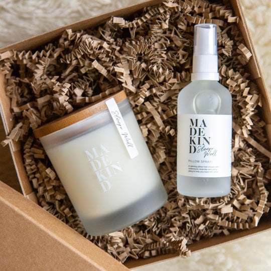 Photo of the MadeKind Sleep Well candle & Pillow spray in a gift box