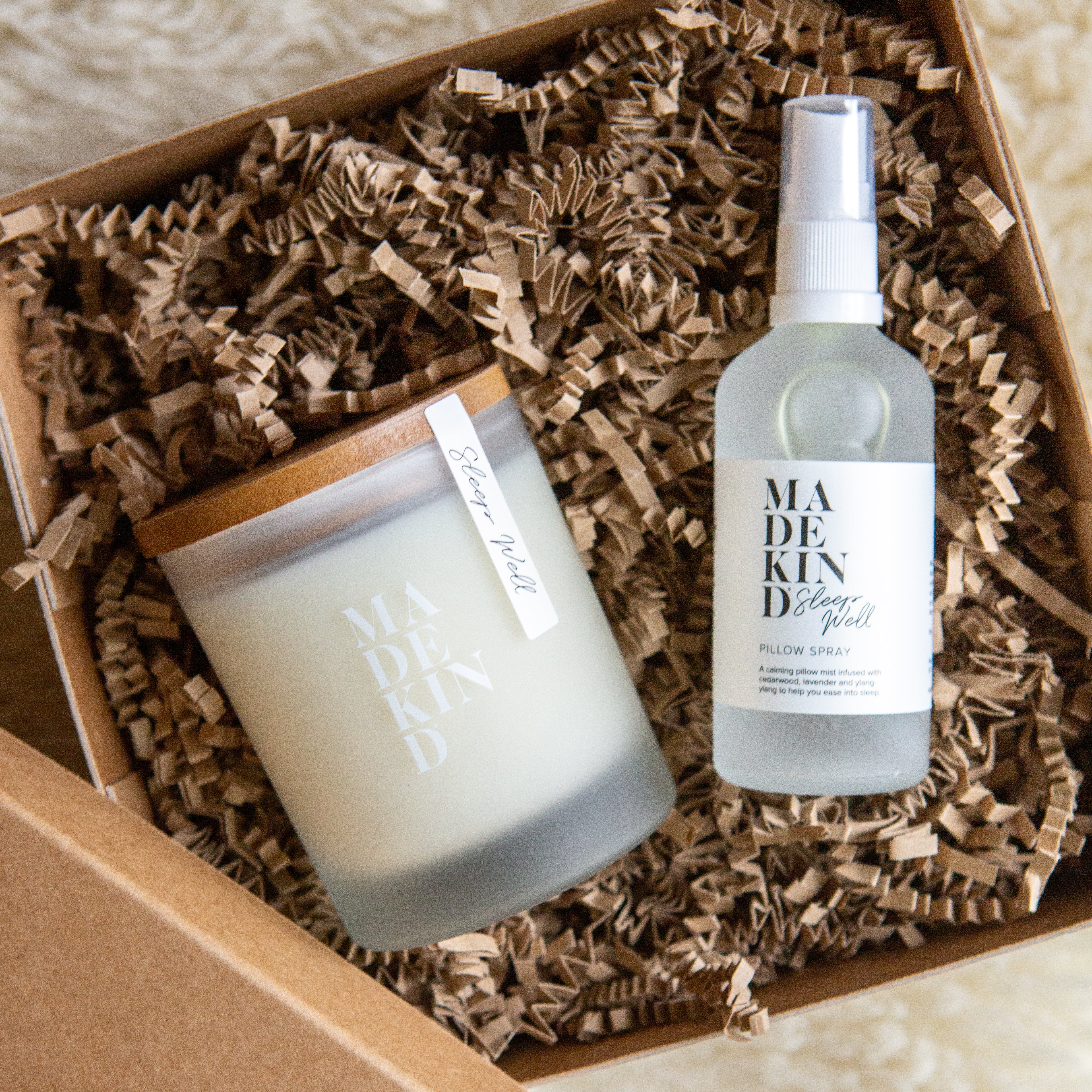 Photo of the MadeKind Sleep Well candle & Pillow spray in a gift box