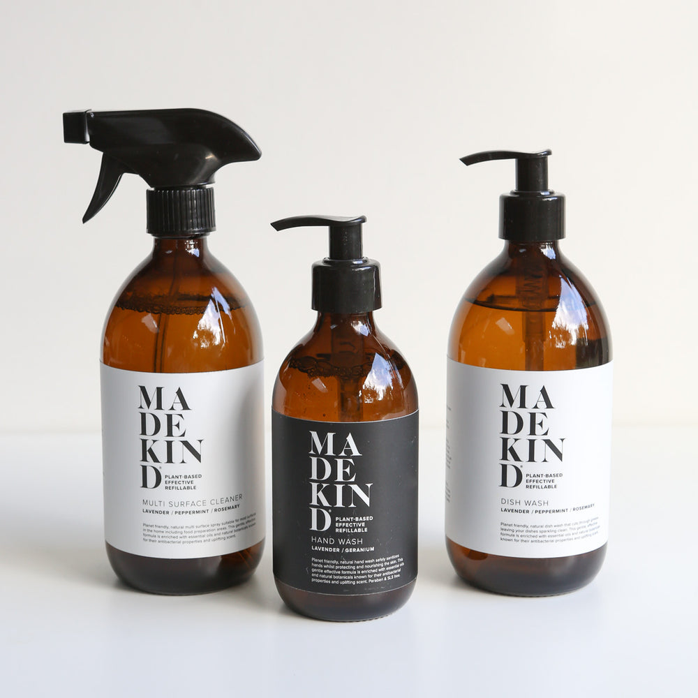 Photo of MadeKind multi surface cleaner, dish wash and luxury hand wash in amber glass bottles