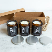 Load image into Gallery viewer, Three hand poured aromatherapy soy wax candles to give feelings of wellbeing. Each candle is scented with blends of pure essential oils which are known for their beneficial qualities. The three scents of candle are &quot;Focus&quot; which includes Lavender, Rosemary and Eucalyptus to increase parity of mind and focus. Unwind includes Rose, Jasmine and Ylang Ylang to reduce anxiety and stress. Awaken helps you feel revitalised including Lemon, Eucalyptus and Peppermint.
