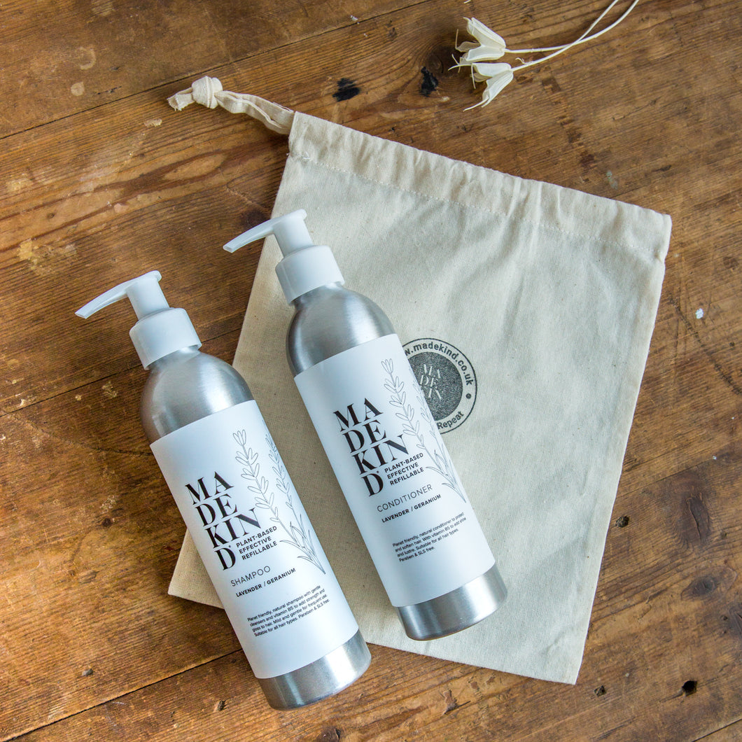 Natural and nourishing hair shampoo and conditioner in refillable aluminium bottles. The best natural shampoo for curly hair. Moisturises and conditions leaving hair cleansed and shiny. Natural, biodegradable ingredients mean it's kind to the environment and to you. The perfect gift as comes with a free cotton drawstring bag.  Edit alt text
